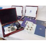 A large collection of commemorative Crowns and other coins in various cases