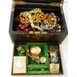 A vintage jewellery box containing costume and other jewellery including garnet set bar brooch,