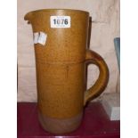 A large Robin Welch studio pottery cylindrical pitcher with strap handle and impressed mark