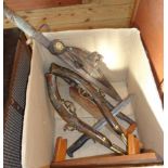 A box containing two pairs of wall hanger pistols and two bayonets with wooden stands - various