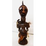 An African tribal carved wood figure from the Lenkiewicz of 2008