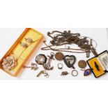 A bag containing a quantity of assorted white metal jewellery items, some marked silver, including