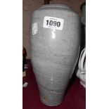 A grey studio pottery vase with indistinct seal mark