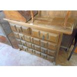 A 3' 7" 20th Century Eastern hardwood chest of two short and three long drawers with panelled