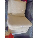 A 20th Century upholstered boudoir nursing chair, set on bun front feet and casters