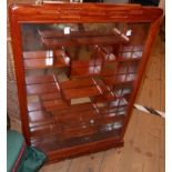 A 20" Chinese polished hardwood wall mounted display cabinet with mirror back and an array of