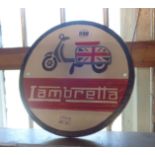 A modern painted iron Lambretta sign