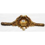 A Neo Classical fire gilt brass furniture pediment with central shell over palladian motif and