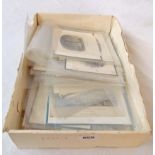 A box containing a quantity of assorted unframed small card prints including numerous monochrome and