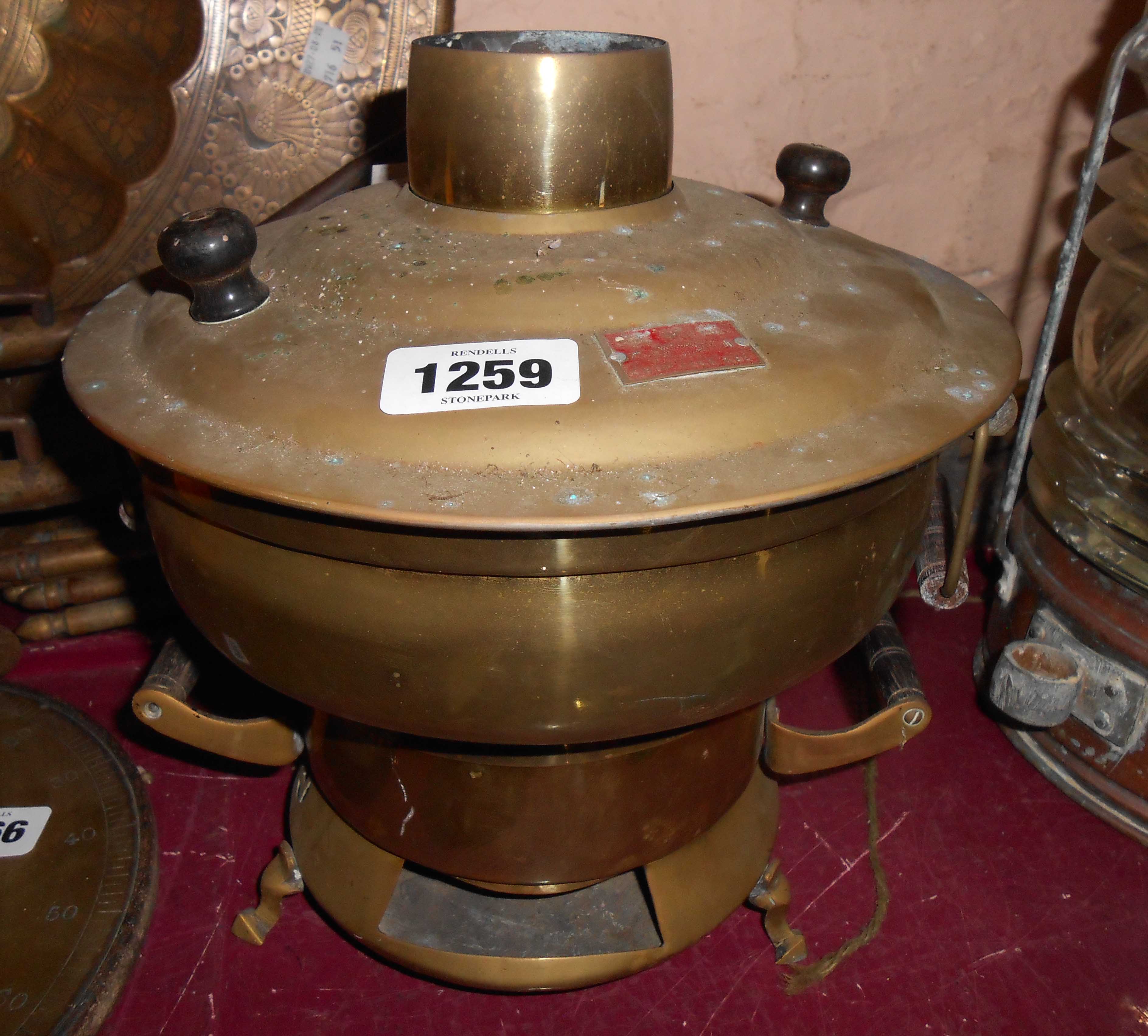 A Chinese brass tabletop cooker