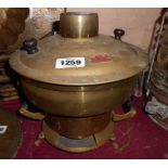 A Chinese brass tabletop cooker