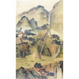 A framed and gilt slipped Chinese watercolour, depicting a mountain landscape with two figures on
