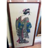 A framed late Japanese woodblock print, depicting a Geisha - signed with seal