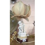 A 20th Century Chinese blanc de chine temple lion figural table lamp with lotus flower pattern