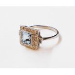 A marked PLAT Art Deco style ring, set with central square cut aquamarine within a diamond border
