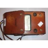 A vintage megameter in leather case - sold with a Casio HR10 mini printing calculator