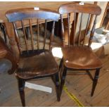 A harlequin set of four antique Windsor style stick back kitchen chairs with solid elm moulded