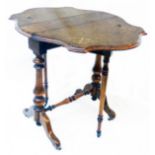 A 20" late Victorian inlaid walnut Sutherland table with moulded shaped top, set on flanking