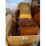 A box containing assorted boxes including microscope case, slide case, stationary rack, etc.