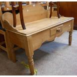 A 1.04m Victorian waxed pine low washstand with shaped splashback and frieze drawer, set on turned