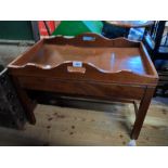A 69cm reproduction mahogany tray top table, set on moulded and chamfered square supports
