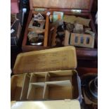 An old wooden First Aid box and assorted contents including brass handles, weights, button sticks,