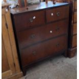 A 77.5cm reproduction mahogany chest of two short and two long graduated drawers, set on splayed