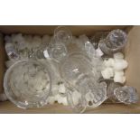 A box of assorted cut crystal including two decanters, pair of candlesticks and jugs