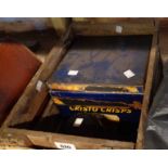 A vintage Schweppes wooden crate, Cristo Crisps tin and a plastic Homepride Man