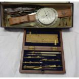 A mahogany cased set of drawing instruments - sold with a box of related items including an aircraft