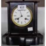 A late Victorian simulated black slate cased mantle clock with Vincent silver medal eight day bell