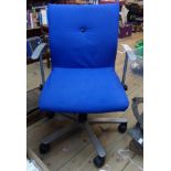A Fritz Hansen (Finland) aluminium framed swivel elbow chair with blue upholstery and adjustable