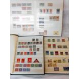 Three stock albums containing a collection of European and world stamps