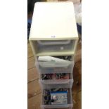 A plastic drawer unit containing various N gauge model railway track and track side items