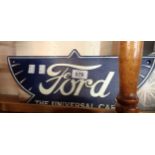 A painted iron Ford sign A modern reproduction painted cast metal Ford sign