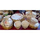 A Royal Crown Derby Royal Pinxton Roses part tea set comprising ten trios, teapot and milk jug