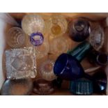 A box containing assorted coloured and other glassware