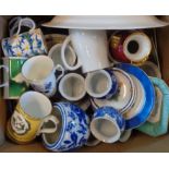 A box of assorted china