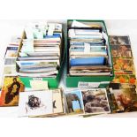 Two shoeboxes containing a large collection of mainly mid to late 20th Century postcards,