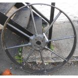 An 86.5cm diameter cast iron drive wheel