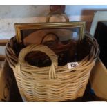 A log basket containing, mirrored wall bracket, etc.