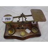A set of Victorian postal scales with associated weights