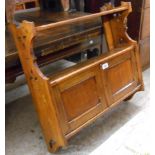 A 61cm late Victorian oak Gothic style wall hanging cabinet with two shelves, pair of panelled