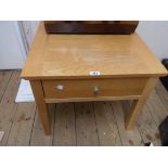 A 60cm modern light oak effect tea table with frieze drawer, set on square legs - for repolishing