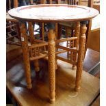 A 50.5cm diameter 20th Century Islamic Khatam inlaid topped table, set on decorative folding