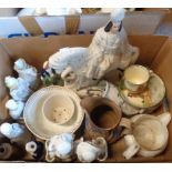 A box containing assorted Staffordshire figurines, porcelain nodding figurines, etc.