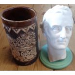 A Parian bust of the Duke of Wellington, broken and mounted on an associated hardstone stand -