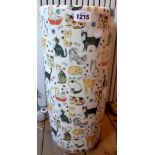 A china umbrella stand decorated with cats