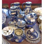 A collection of Wedgwood dark blue Jasper dip items including jugs, vases, trinket boxes,