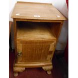A 39cm 20th Century bow front bedside cabinet, set on carved cabriole legs with pad feet